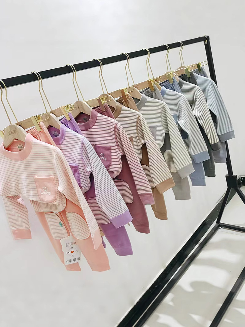 新款星空条德绒口袋印花护膝款儿童秋衣秋裤自发热中领条纹家居服